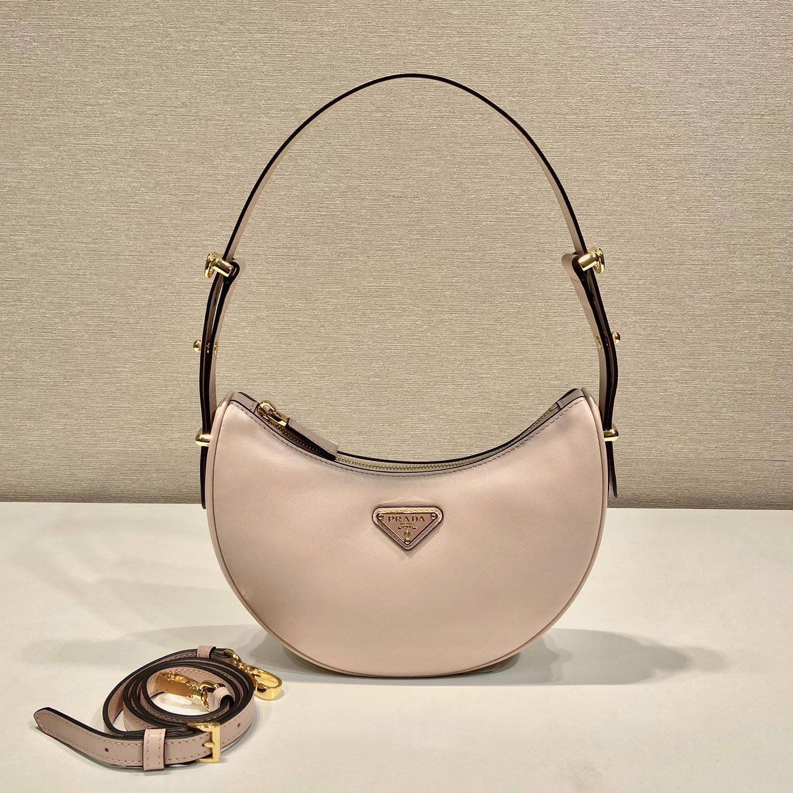 Pra*a top handle bags